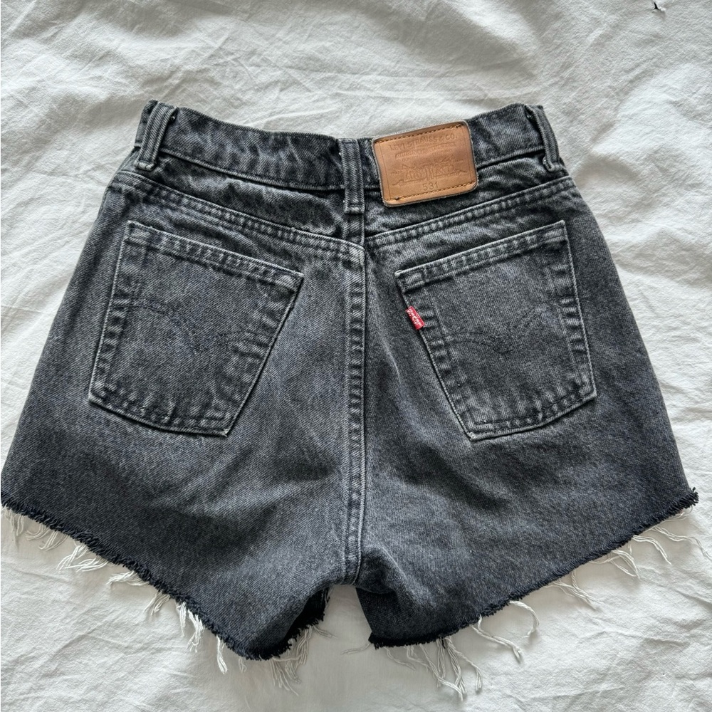 Vintage Levi's distressed Black Denim Shorts, size 25